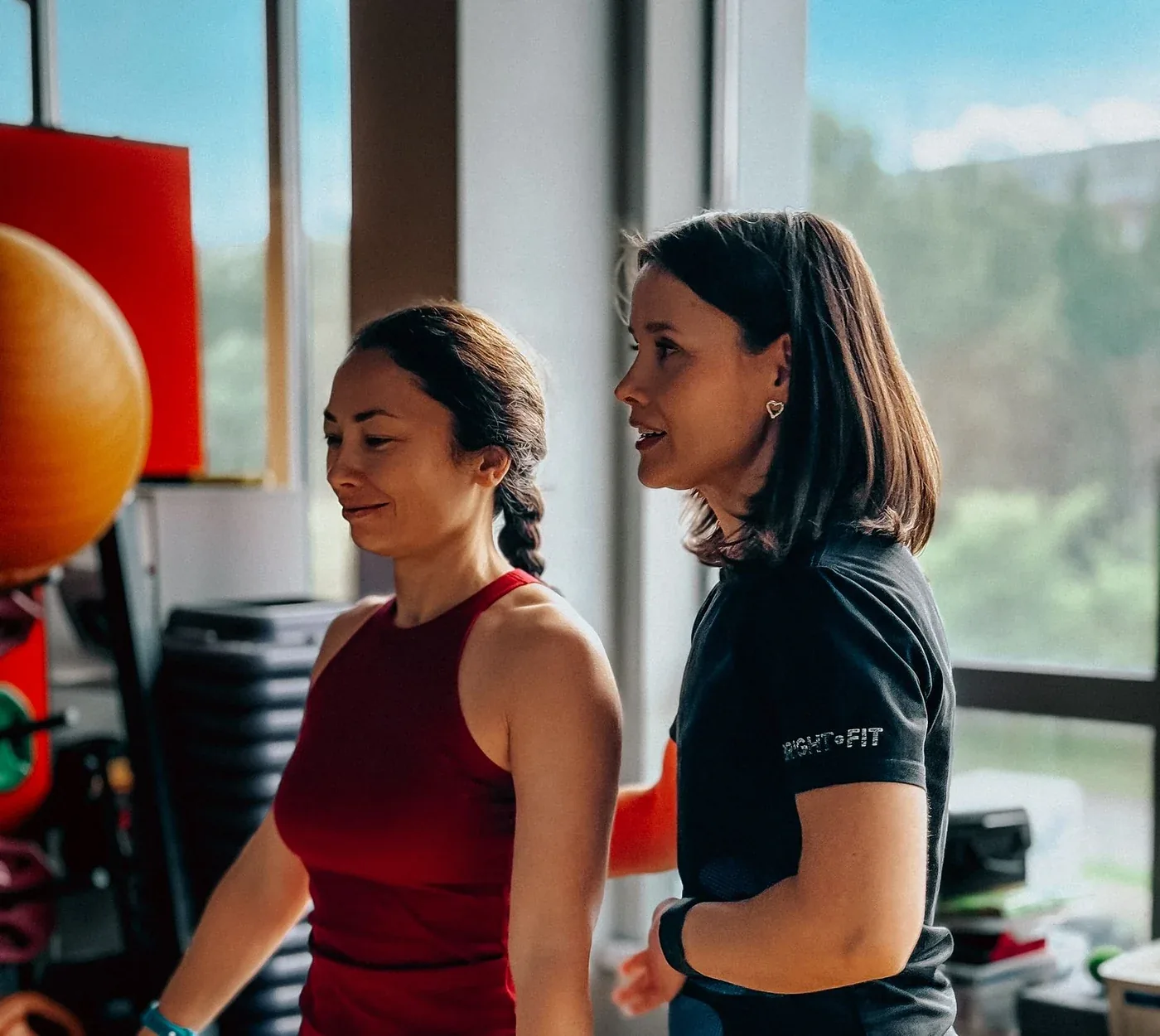 Woman training with a fitness coach as part of a fat loss programme