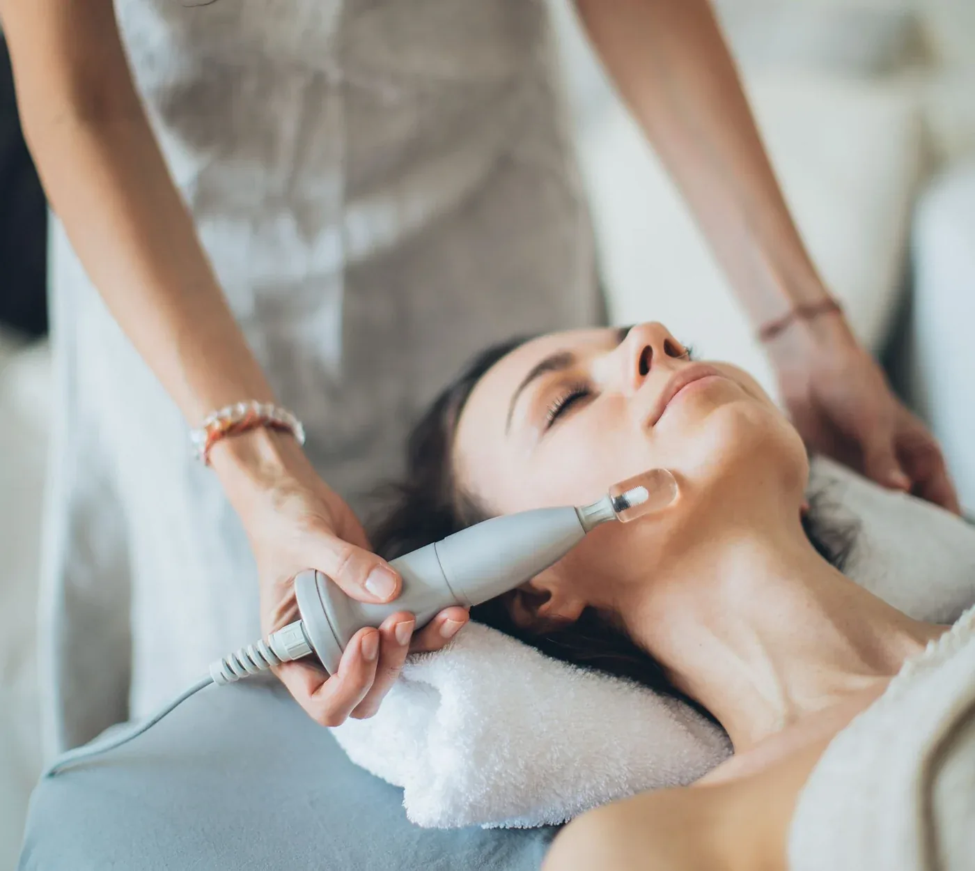 Woman receiving a skin rejuvenation facial